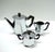 This rare Ottagonale Alessi tea set of 4 pieces,including the tray,are used and is in good vintage condition. Cleaned and...