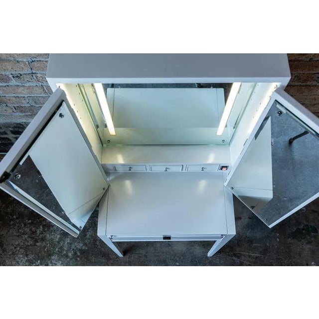 Gorgeous, slim, tall and rare mid-century Drexel vanity. Recently lacquered in a beautiful off-white (Benjamin Moore Cloud...