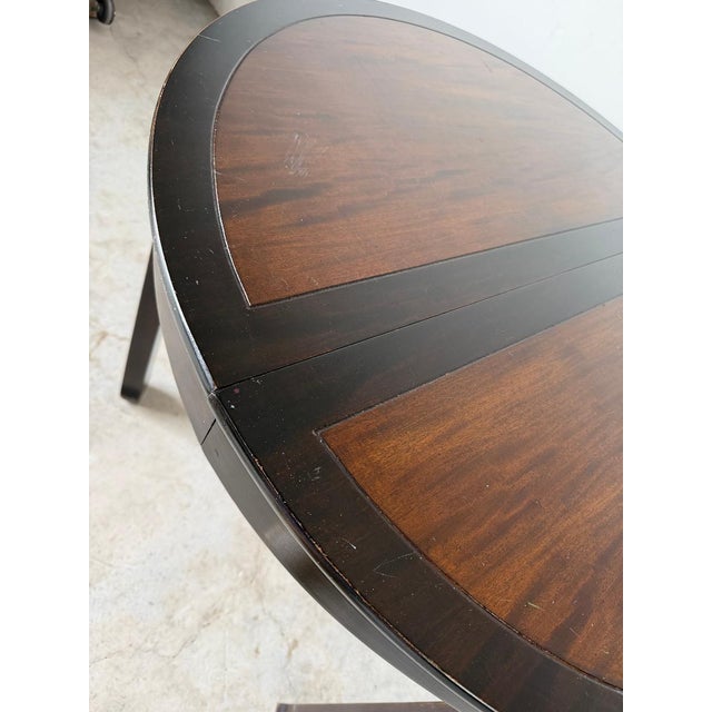 Wood Vintage Asian-Style Black Lacquer Wood Round-to-Oval Extension Dining Table For Sale - Image 7 of 18