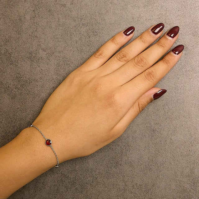 Embrace timeless elegance with this exquisite bolo bracelet, delicately crafted from rhodium-plated .925 sterling silver....