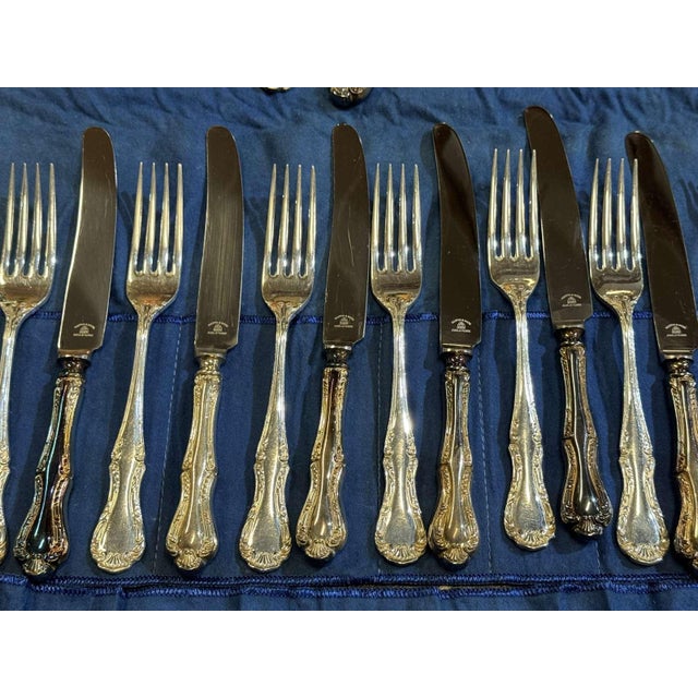 Mappin and Webb Russell pattern silver-plated knife and fork set of 12 - Knives L=24cm, Forks L=20.5cm This piece has an...