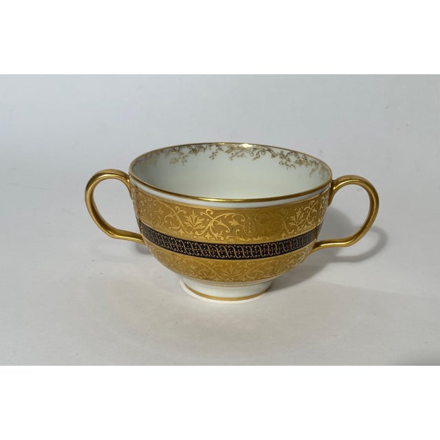 A great set of cobalt blue and nicely gilded soup or dessert cups with their saucers, 16 pieces total. By the world re...