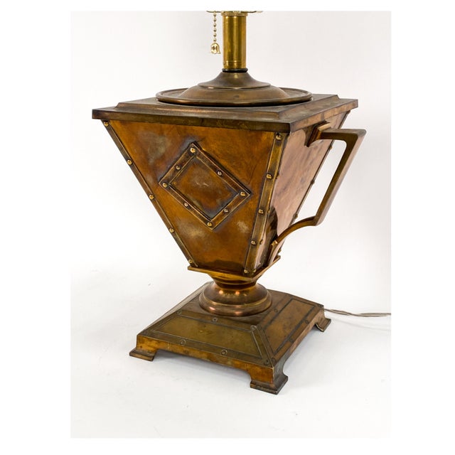 An antique Bradley & Hubbard Arts & Craft style brass and copper table lamp in the form of an inverted pyramid (a square...