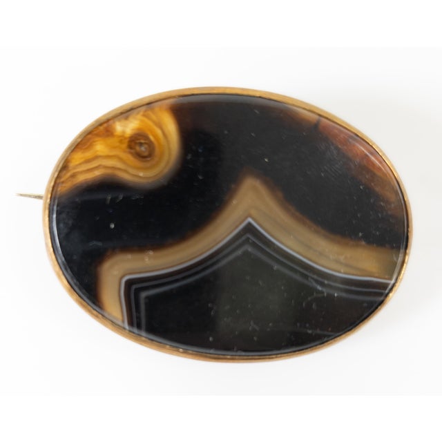We are selling this stunning purple banded agate brooch pin, the purple agate looks a little like blue john or Derbyshire...