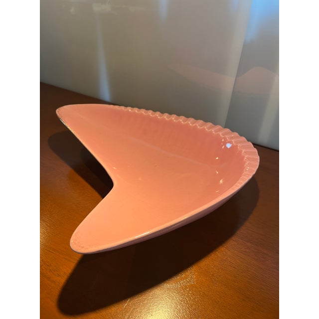 Very strong shape! Incredible color! We've used this for candy, treats, all sorts of goodies for events. Fabulous!