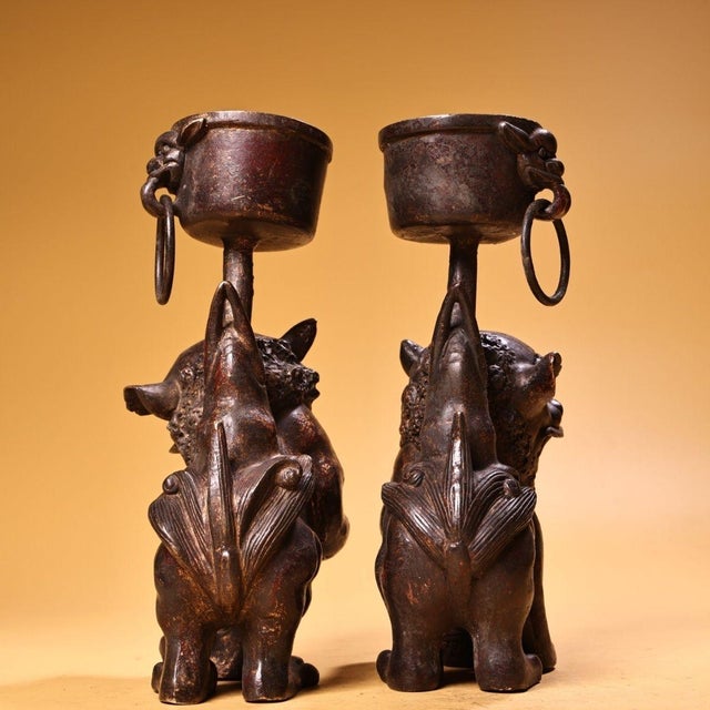 This is a stunning pair of vintage Chinese gilt bronze Foo Dog (Guardian Lion) candle holders. The mythical beasts are...