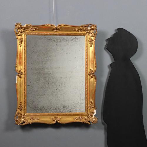 Wood and pastiglia mirror. Floral, leaf, scroll, and shell carvings in the four corners. Mercury mirror. Some missing...