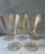 Set of 5 amber crystal wine glasses with a beautiful swirl pattern. One glass with small chip in the glass foot.