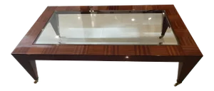 1980s Glass Inlaid in Wood Coffee Table With Brass Roller Feet