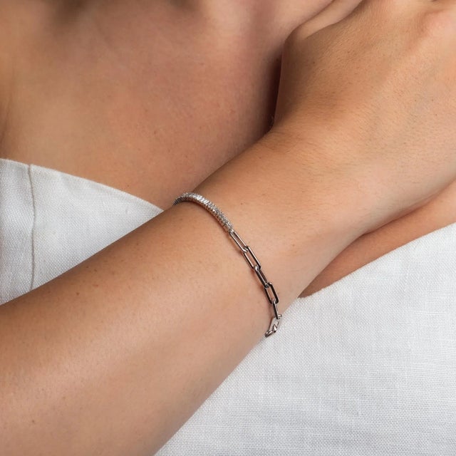 This is part of Chairish’s Fine Jewelry assortment. Baguette diamonds are sophisticated and chic. Here we paired the...