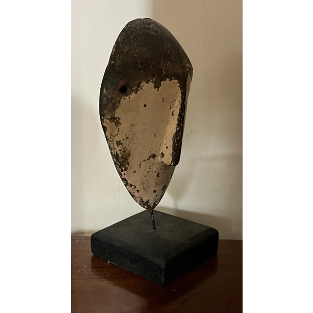 Carved wood Lega passport mask, Democratic Republic of the Congo, early 20th century. Small Lega masks are called...