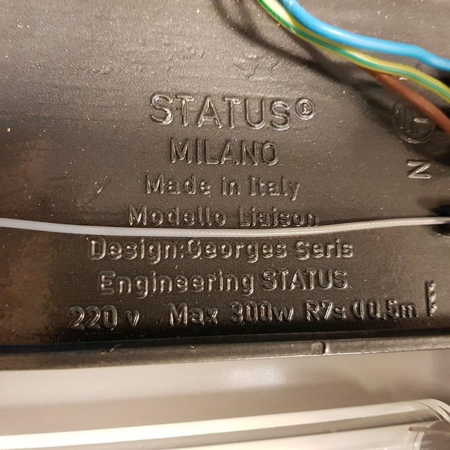 Status design liaison wall lamp georges seris lamp italy design by georges seris, 1991. Cast aluminum wall lamp with...