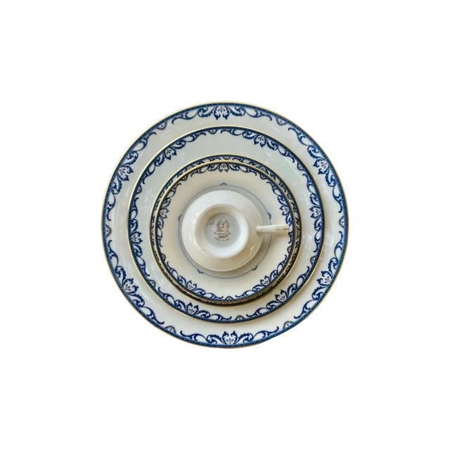 Beautiful 12 place set that also comes with a Bowl and serving charger. Perfect condition!