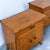 Charming pair of vintage mid-century bedside cabinets, dating from approximately the 1950s. Their compact proportions,...