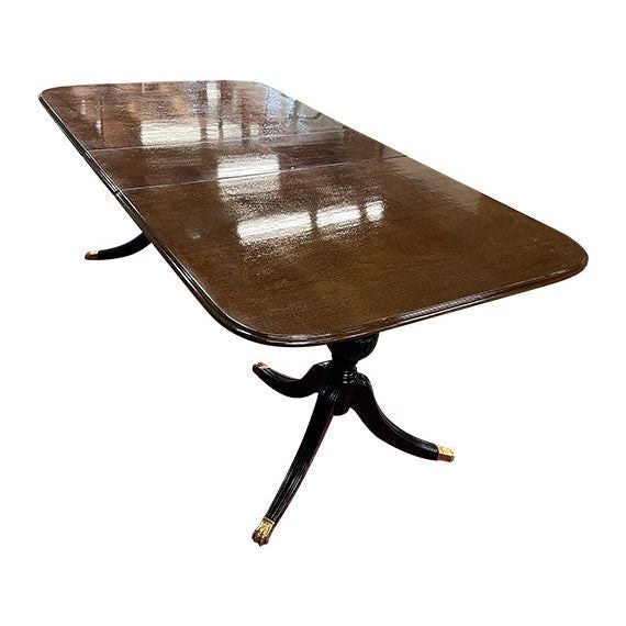 Warm, sculptural, and timeless, this vintage dining table showcases the rich character of burlwood grain paired with an...