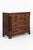 A wide Flamed mahogany Victorian chest of drawers with an arrangement of two over three long drawers. The smooth running...