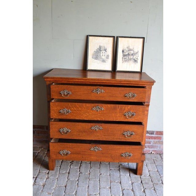 19th-century Dutch oak chest of drawers, sideboard, or dresser. Height: 101 cm. Width: 103 cm. Depth: 51 cm. With four...