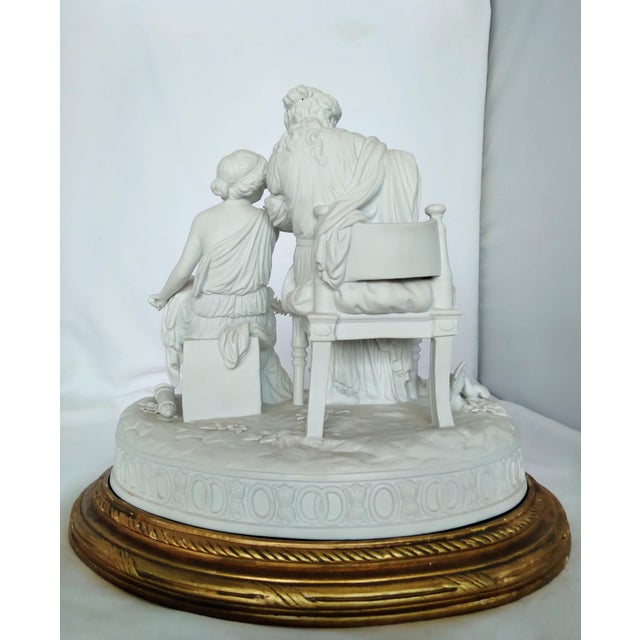 Beautiful European bisque porcelain figural group in an elegant 18th-century-inspired style. The underside bears a simple...