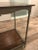 This Baker side table makes a great addition to any space! A hand planed Acacia top offers a rugged patina. The iron...