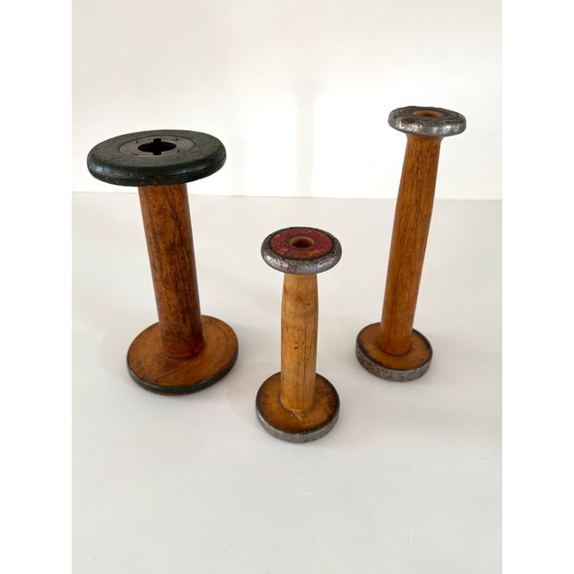Set of 3 antique wooden spools used in the textile industry circa 1930-40s. Graduated in size, they make a nice tiered...