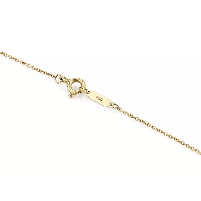 Tiffany & Co. Notes 18k Yellow Gold Round Wave Pendant For Sale In Miami - Image 6 of 6