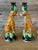 A whimsical pair of vintage figural ceramic candlestick holders crafted in the manner of Lynn Chase, featuring seated...