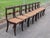 Crafted in the iconic 19th-century Neo-Classical tradition, this set of eight vintage Duncan Phyfe style dining chairs...
