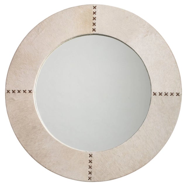 This beautiful mirror is created from naturally selected grey hair on hide, whip stitched together with white leather as a...