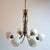 Stilnovo style 1950's Italian chandelier consist of 6 curved brass arms holding opaline shades. The stem is elegantly...
