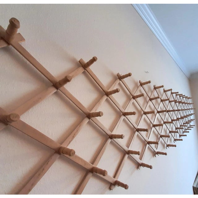 Massive 75 peg accordian style wall rack! Blonde wood rack to hold countless things. Perfect in a closet, hallway,...