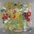 A modern impressionist floral still life filled with color in a high quality printed canvas floated in a natural wood...