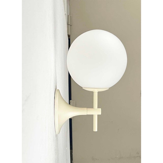 Elegant wall lights by Temde, designed by E.R. Nele. Often mistakenly attributed to Max Bill. Classic yet timelessly...