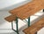 This antique beer garden set (bierzelt) in pine wood and painted steel features a long table and two matching benches, all...