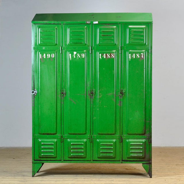 This locker was made in France around 1950 and has four compartments to store all your belongings. In the upper part a...