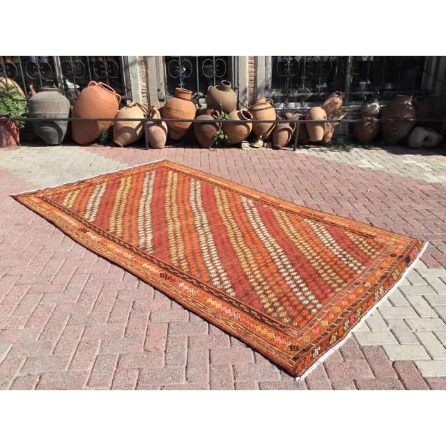 This beautiful, vintage, handwoven kilim is approximately 50 years old. It is handmade, of very fine quality hand spun...