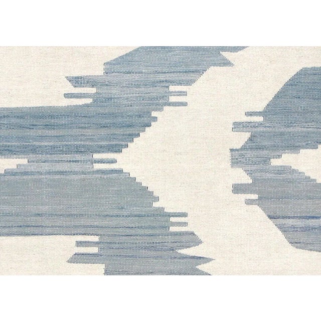 Contemporary Egyptian Kilim in Ikat Design. Hand woven in an Ikat design with wool on cotton foundation in the Fustat...