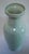 This baluster form celadon green vase is embossed with flowers and ferns. It is from a collection of estate sale vases and...