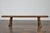 Crafted from solid pine with rustic charm, this American 20th-century bench showcases timeless craftsmanship. Its hand-...