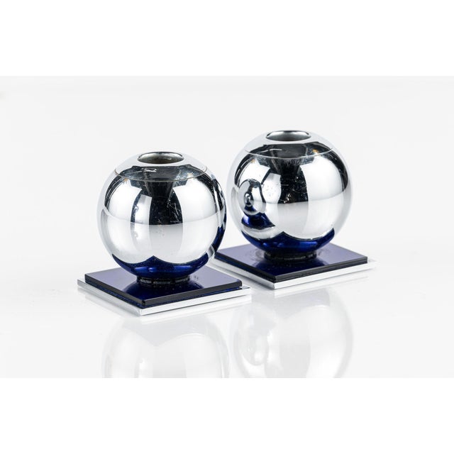 This pair of vintage American Art Deco candleholders was designed by Walter von Nessen for Chase circa 1935. The compact...