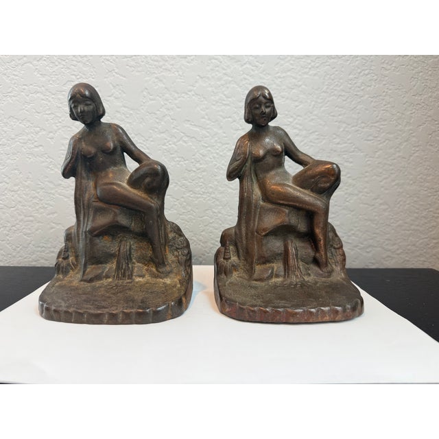 These beautiful mid-century modern bookends will make a statement on any table or shelf. Each one weighs about 5 lbs.