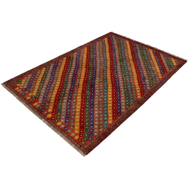 A mesmerizing addition to any décor, this exhilarating hand-knotted rug featuring exquisite coloration in an intricate...