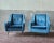 A refined pair of armchairs made in the mid-20th century. Recently restored in blue velvet, the armchairs are in excellent...