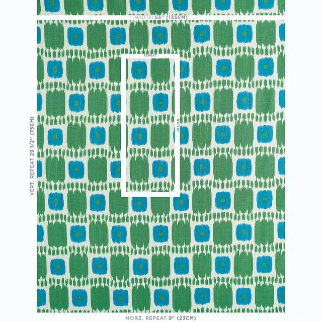 Kandira features a graphic pattern derived from woven ikats. A painterly checkerboard design with tonal variations and a...