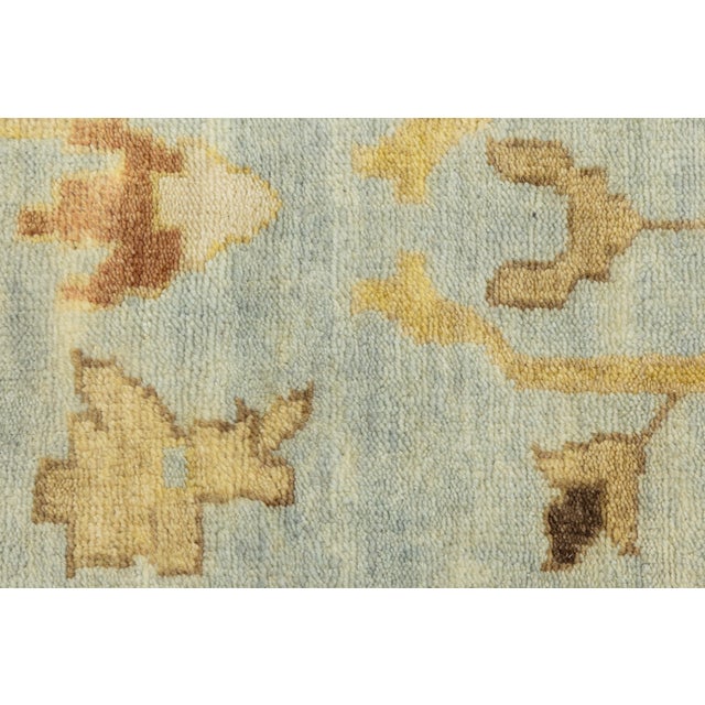 2020s Modern Hand-Knotted Oushak Style Wool Area Rug in Soft Sky Blue and Ochre Gold For Sale - Image 5 of 12