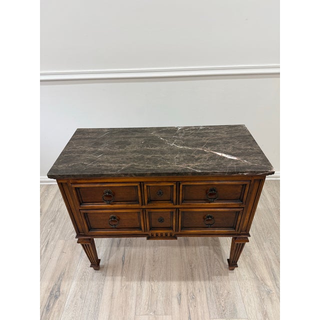 The Ethan Allen Tuscany Marble Top Console Table Server Nightstand End Table is a stylish and functional piece of...
