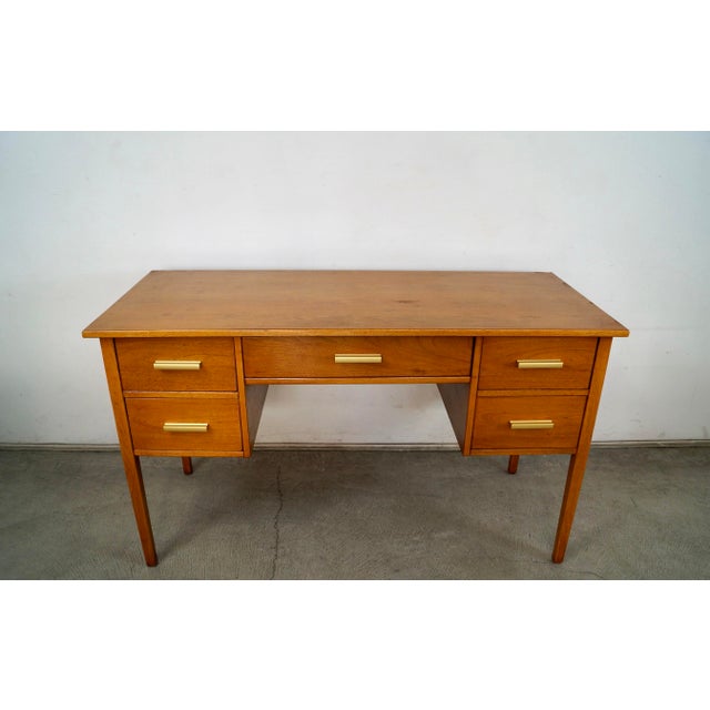 Vintage 1950's Mid century Modern executive desk for sale. It's really well built and solid, and made of beautiful walnut...