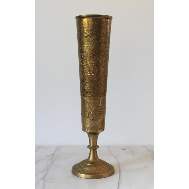 Vintage hand-etched solid brass trumpet vase with a pedestal base, crafted in India during the mid-to-late 20th century....
