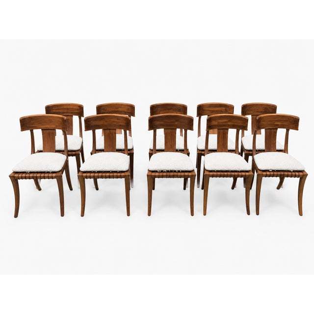 Solid walnut chairs. Modern Klismos dining chairs with upholstered seats cushions. The Robsjohn Gibbings style Klismos...