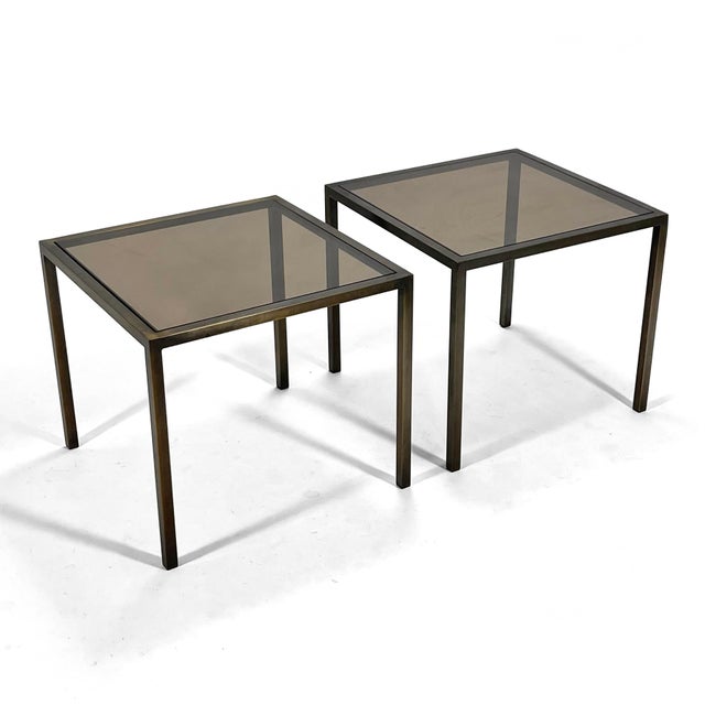 These striking end tables have a beautiful, subtle, minimalist design with bronze plated frames and inset bronze glass...