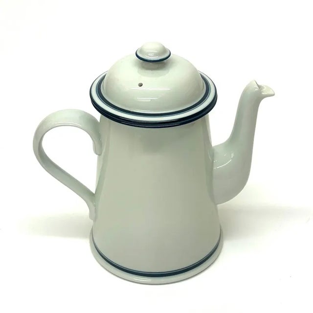 White ceramic coffee pot. This is a vintage, stunning, white Christianhavn ceramic coffeepot with blue striped detailing...
